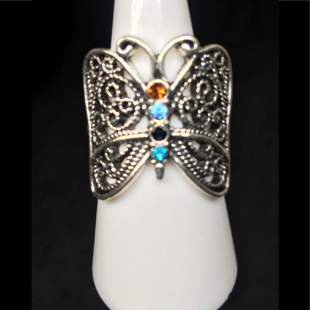 Silver Butterfly With Gemstones Going Down The Spine Of The Ring